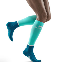 a close up of legs with compression socks