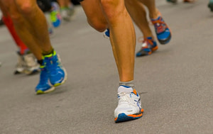 runners on pavement during a race