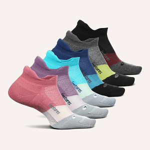 High quality running socks are important for preventing blisters and improving comfort and support. Feetures socks, pictured, are a high quality running sock.