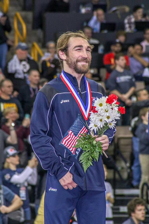 a man standing in front of a crowd
