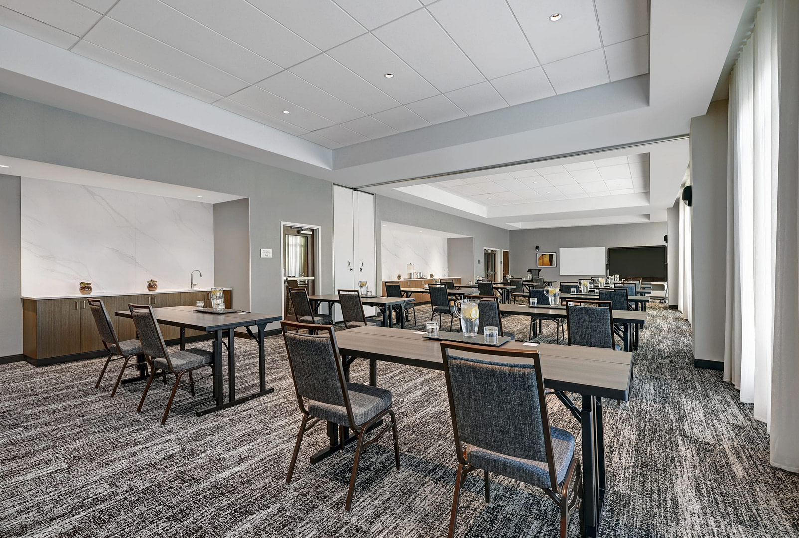 a room filled with furniture and a table