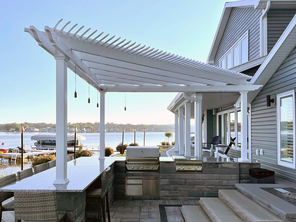 Triangle pergola on an outdoor kitchen overlooking the bay