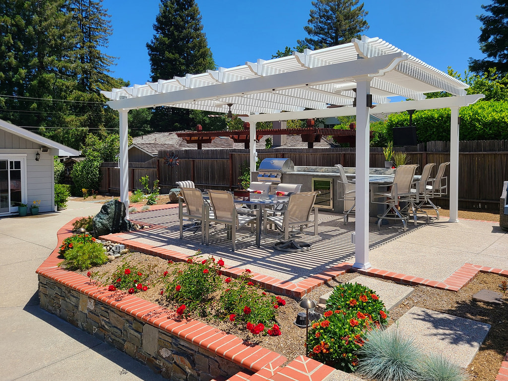 Large patio pergola over dining and outdoor kitchen