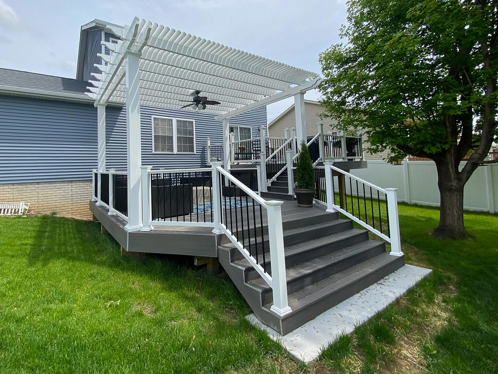 Freestanding shade pergola on a deck with outdoor fan