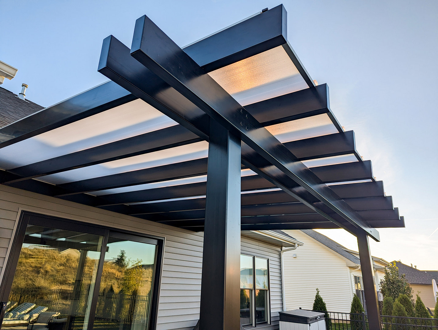 14x12 Elements patio cover pergola in black with glacier white roof panels