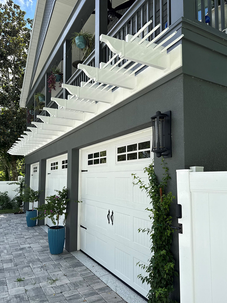 eyebrow pergola attached over garage