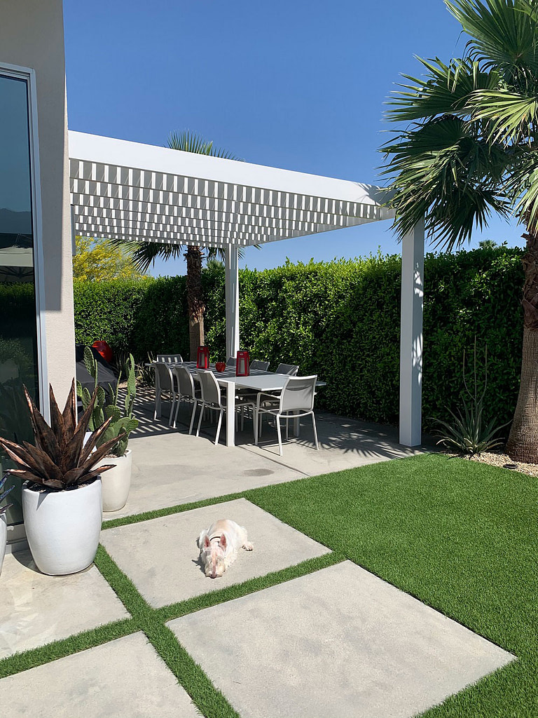 modern style heartland pergola over a concrete patio and dining area