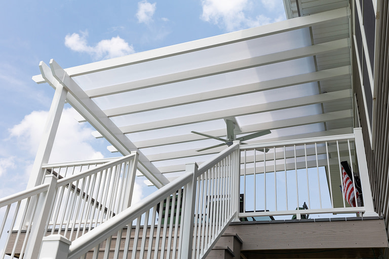 view of polycarbonate pergola roof from under the pergola