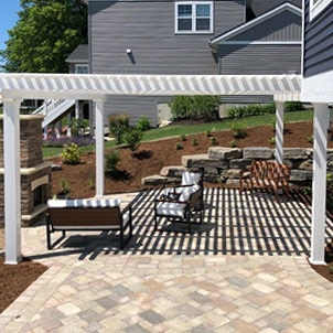 50% shade pattern on the patio under a shade pergola