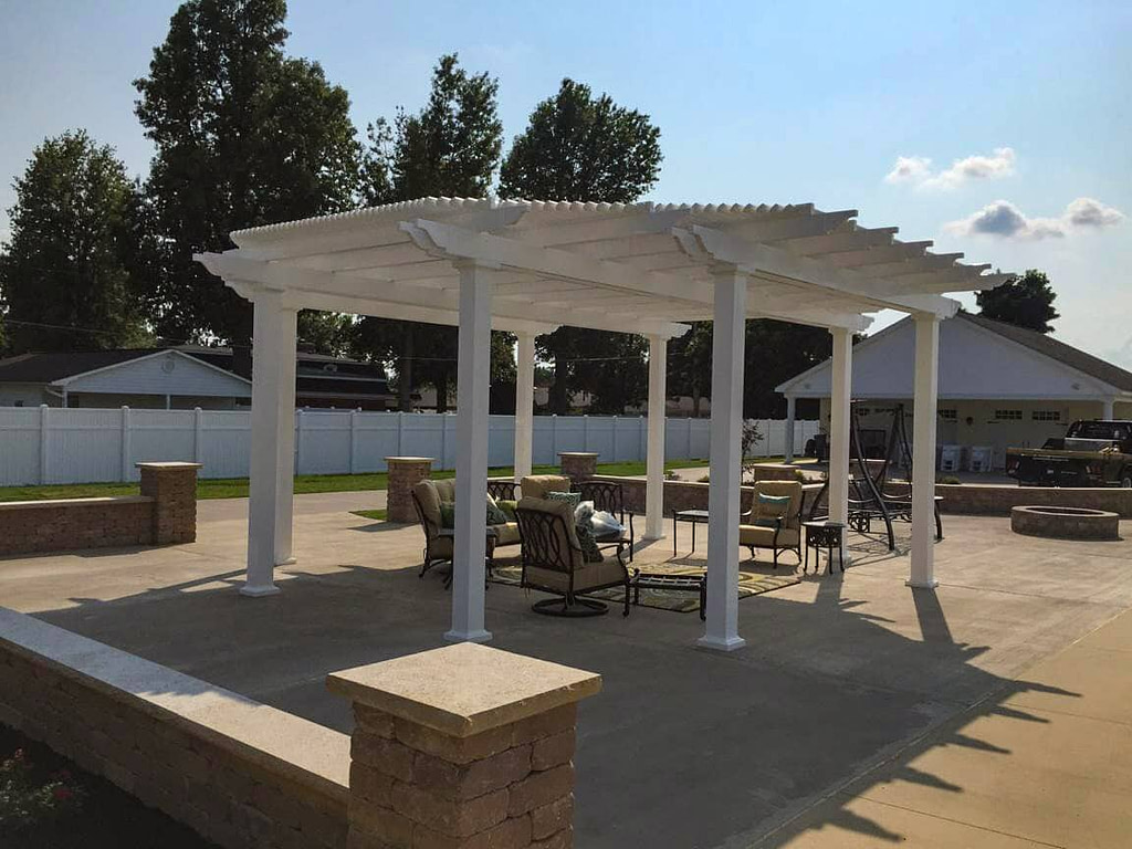 octogon pergola with shade over a patio