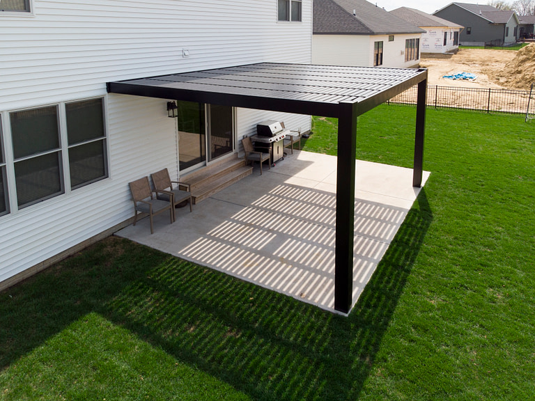 black attached modern pergola over patio