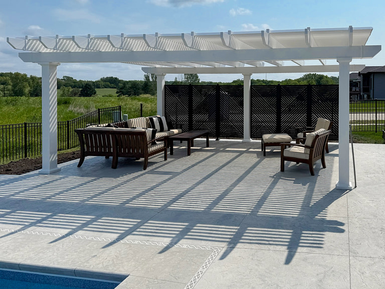 Heartland Shade Pergola with aluminum decorative panel privacy wall