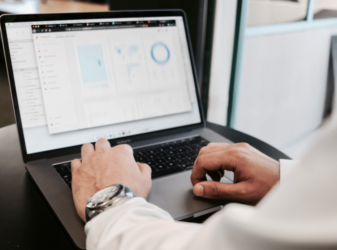 businessman using macbook