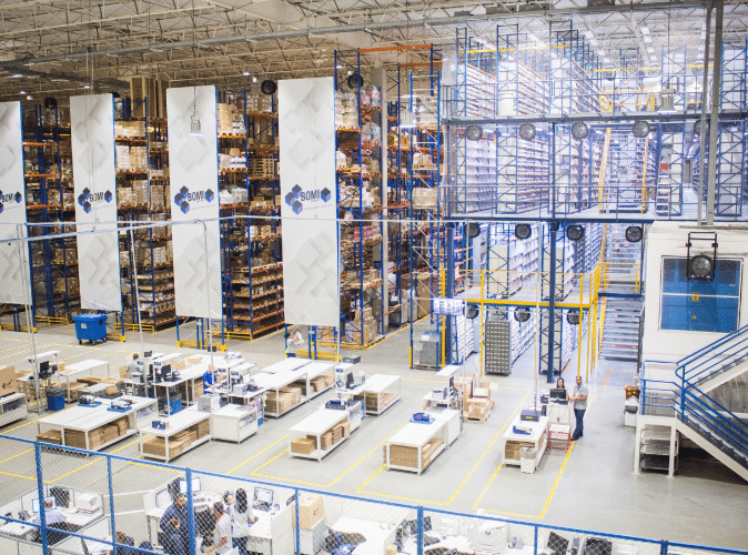 Large warehouse with workers