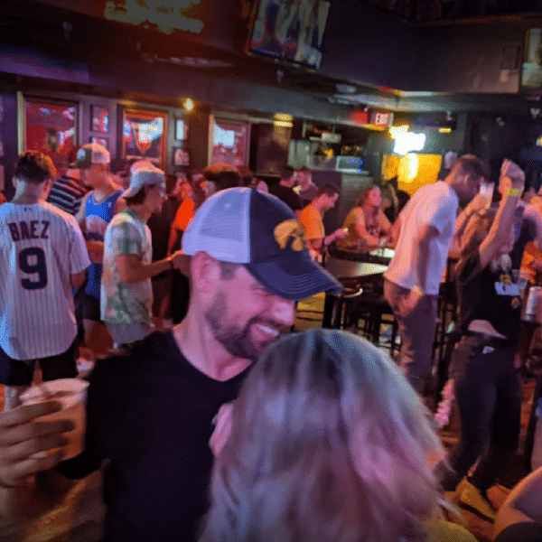 a group of people standing in front of a crowd