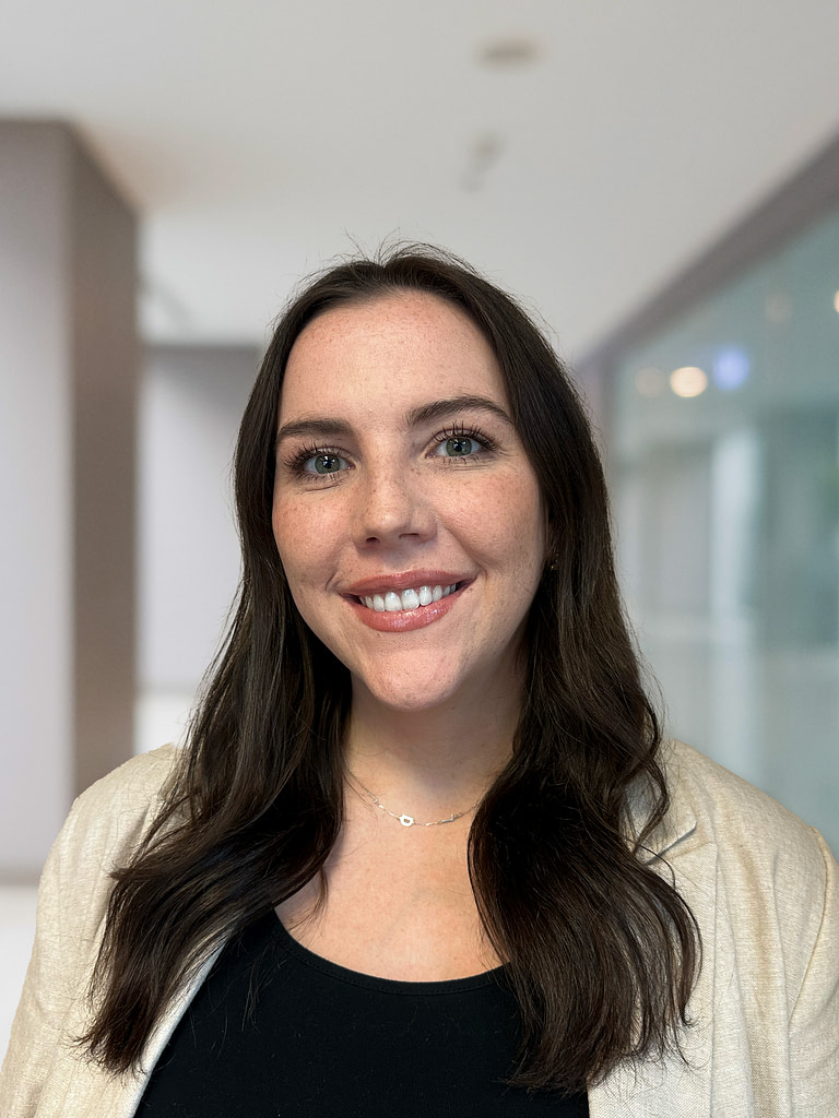 Professional woman smiling in office environment