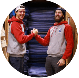 two movers shaking up and smiling