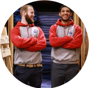 two movers smiling with arms crossed