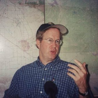 Portrait of a man speaking on a meeting